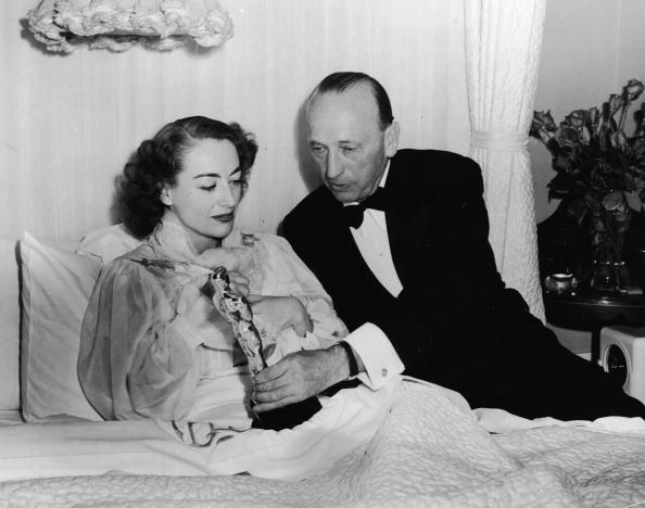 Crawford Receives Oscar In Bed